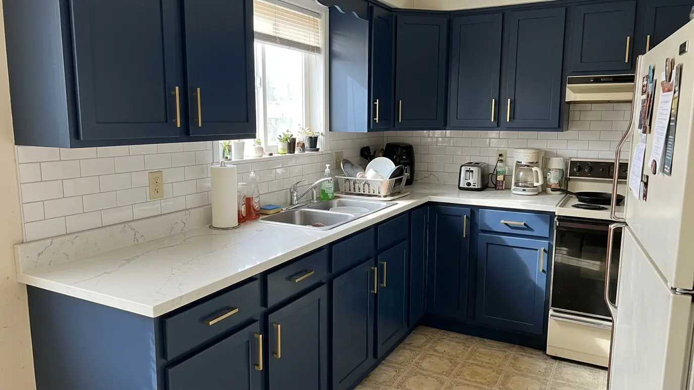 After: Dated kitchen gets custom cabinets | Music City Carpenter After: a kitchen with custom painted shaker cabinets with brass hardware and a new counter and backsplash