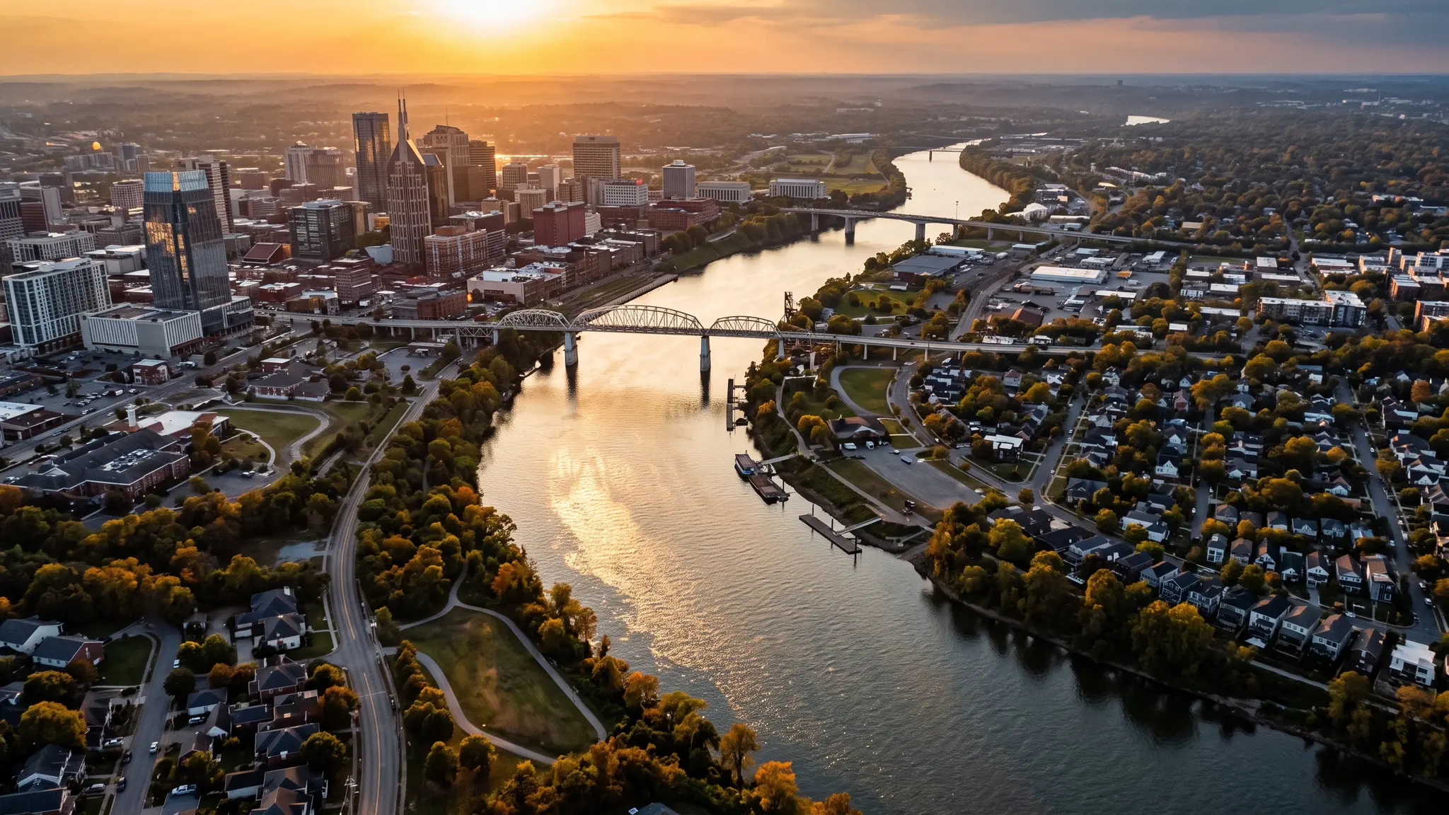 Carpenter service areas in Middle Tennessee | Music City Carpenter Aerial view of the Cumberland River winding past the Nashville skyline and Middle Tennessee neighborhoods at sunset